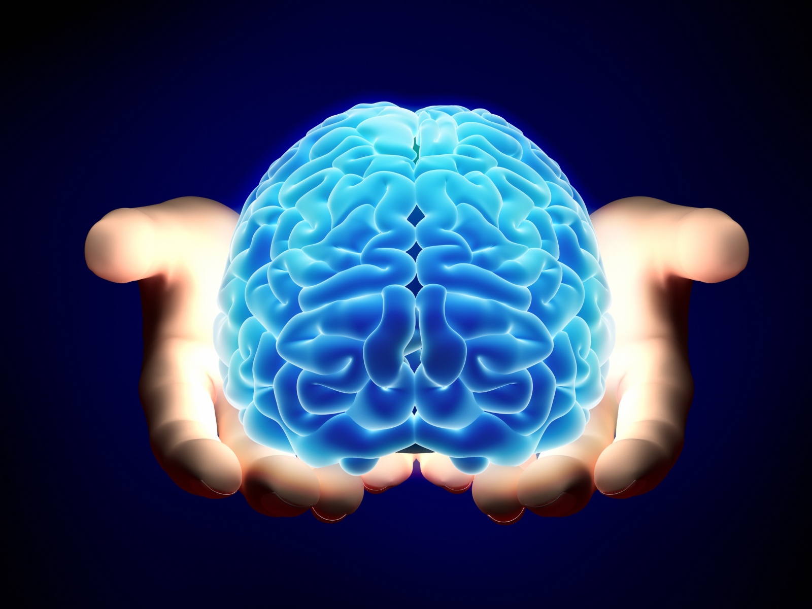 Glowing brain held in hands